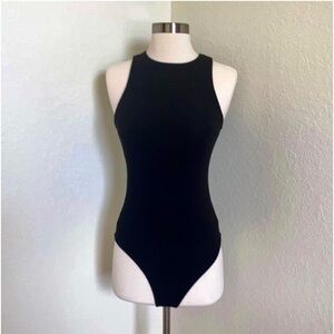 🆕knit black sleeveless bodysuit! Snap bottom! Size Medium! USA! Soft jersey!